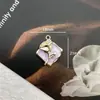 Nova gota de cor acessórios de liga de óleo temperamento joias rosa alto senso acessórios de cabelo brincos colar chaveiro pingente