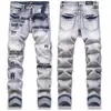 Nova marca europeia e americana de moda de rua, jeans com patches e rasgos de cor clara para homens, corte slim, calças compridas estilosas e casuais