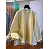 Elegante sudadera amarilla de cuello en V, estilo dos piezas falso, para mujer, nuevo estilo otoño 2026, suelta, extragrande, top tipo pullover que cubre el trasero