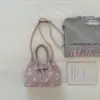 Bolso de axila de moda estilo coreano, lindo y moderno, nuevo modelo verano 2026, simple y elegante, adecuado para el trabajo y los desplazamientos, con un diseño único y atractivo