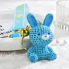 Llavero de conejo de lana de dibujos animados de resina creativa, llavero de coche exquisito, colgante para bolso de mujer, joyería de máquina de garra, venta al por mayor