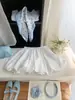 Falda de cuadros retro tipo capullo para mujeres petite, falda corta versátil de línea A anti-exposición para verano, falda abullonada en blanco y negro