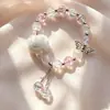 Novo bracelete de miçangas de vidro floral para mulheres, com pompons e franjas, acessório cultural e criativo para estudantes, item popular em locais turísticos, joias de mão para atacado