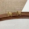 Pendientes Minimalistas de Oro con Moneda de Caballo para Mujer 2026 Nuevo Estilo Pendientes de Alta Gama que Simbolizan Riqueza Instantánea