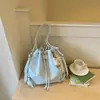Shuai Mi Home Bolso Cubo de Moda Coreana con Cordón Simple 2026 Nuevo Nicho de Moda de Alto Valor Bolso de Hombro