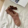 Calcetines Lolita para mujer otoño e invierno dulces calcetines de tubo para mujer al por mayor calcetines de rizo con lazo para niñas Lolita japonesas algodón