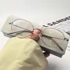 Armazón ovalado de titanio estilo nerd, moderno y apto para lentes de prescripción, gafas lisas estilo 'old money' para mujer, venta al por mayor de anteojos para hombre