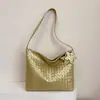 Bolsa de mão de alta qualidade com textura tecida 2026 nova elegante simples de carregar na mão alto valor de aparência textura bolsa de ombro único sob o braço