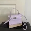Bolsa Kelly Nova Outono/Inverno 2026 Estilosa Textura Fashionable Versátil de Ombro Cruzada de Mão com Emblema de Crocodilo Leve de Luxo