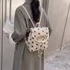 Mochila de encaje con lunares de nuevo estilo 2026 transfronteriza con cordón de lazo, mochila de nicho suave para el día a día