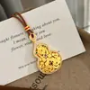 Nuevo colgante de calabaza filigrana estilo chino chapado en oro microincrustado carácter Fu Lu Fu para mujer 2026 cadena para suéter de clavícula de lujo ligero regalo