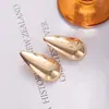 Pendientes ovalados geométricos de metal estilo exagerado personalidad europea y americana de nicho transfronterizo temperamento simple versátiles pendientes de alta gama