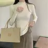 Al por mayor Hongo Negro Borde Medio Cuello Alto Tejido Capa Base Top Mujer Otoño Invierno Ajustado Manga Larga Ropa Interior Suéter Versátil Elástico Superior