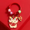 Dragón lindo año del dragón metal dragón etiqueta pequeña colgante Año Nuevo llavero de coche accesorios para bolso regalo pequeño para pareja venta al por mayor