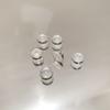 100 piezas de silicona transparente Frisbee cabeza de bala flor de ciruelo tapón para los oídos trasero tapón para los oídos DIY accesorios de joyería pendiente tapón para los oídos