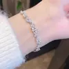 Pulsera de flor de glicinia con un diseño único, ajustable, de lujo ligero, exquisita, nuevo modelo popular, de lujo ligero, a la moda, pulsera de alta gama