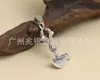 Plata de ley S925 al por mayor plata tailandesa vintage leyenda del Tíbet colgante de cinco hilos con mortero de diamantes cuchillo de luna hebilla de semilla de melón