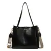 Bolsa Tote de Gran Capacidad para Mujer 2025 Principios de Primavera Nueva Moda Texturizada Bolso de Hombro Color Sólido Versátil Correa de Hombro Ancha Bolso Cruzado