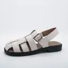 Sandálias Romanas com Dedos Estilo Coreano Versátil para Todas as Ocasiões Femininas Verão 2023 Novas Estilo Francês Trançadas Vazadas Planas Sapatos Gaiola de Porco