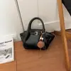 Bolso pequeño súper popular para mujer, nuevo de verano 2026, vintage, para la oficina, de hombro y cruzado, tipo cesta