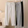 [Especial] Pantalones deportivos casuales de otoño 2026 para mujer talla grande, nuevo diseño de borde inclinado plisado, pierna curva 1011