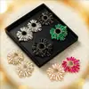 Brincos de Girassol Europeus e Americanos Transfronteiriços de Liga de Metal Incrustados com Strass Coloridos para Mulheres, Brincos de Jantar da Moda Super Brilhantes Tendência