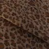 Venta al por mayor de fábrica Tela para ropa de chaqueta cálida de otoño e invierno, terciopelo granular con estampado de leopardo de trigo, terciopelo estampado, 400 g, engrosada