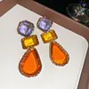 Brincos e Colar de Resina Oval Gota d'Água Estilo Vintage Europeu e Americano, Corrente Única e Ousada para Clavícula, Joias com Sensação de Luxo Leve e de Alta Qualidade