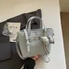 Bolso pequeño de alta gama para mujer, nuevo 2026 elegante versátil bandolera casual popular artículo de moda bolso de mano para el trabajo bolso tipo cubo