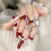 Manicura de mano con acabado de armadura para otoño e invierno con lazo de encaje y parche de uña postiza roja de amor U63