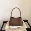 Bolso cruzado francés simple tejido tipo Baguette para mujer 2026 Verano Nuevo estilo Temperamento Bolso para madre e hijo Viaje diario Bolso de axila