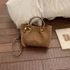 Bolso Pequeño Retro de Alta Apariencia para Mujer 2025 Invierno Nuevo Bolso Cruzado Elegante Bolso de Mano Casual de Moda Bolso Cubo