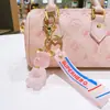 Llavero de Oso de Collar de Gelatina de Resina Creativa Exquisito Tendencia Llavero Colgante de Bolso Máquina de Garra Pequeño Regalo Venta al por Mayor