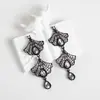 Pendientes Amazon transfronterizos, extragrandes, electrochapados, elegantes, de estilo largo, con un toque de alta gama, adornados con borlas y pedrería negra