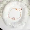 Transmisión en Vivo Venta Caliente Pulsera de Trébol de Cuatro Hojas de la Suerte con Microincrustaciones Seiko Moda de Gama Alta Versátil Lujo Ligero Pulsera para Apilar Venta al por Mayor