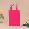Bolsa de mano con recubrimiento de fabricante de origen en stock al por mayor en blanco para compras ropa bolsa no tejida plegable imprimible logo