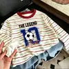 Camiseta de manga larga a rayas de retazos de algodón puro para niños, nuevo estilo primavera y otoño, camiseta básica elegante y holgada para niños