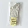 Embalaje separado calcetines de mujer color algodón transpirables color caramelo tobilleros bajos calcetines de barco para mujer calcetines de color liso puesto de calcetines venta al por mayor