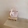 Bolso de mano de comercio exterior moderno y súper popular, nuevo bolso versátil para mujer primavera-verano 2026, bolso cruzado con un toque de alta gama, bolso pequeño