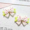 Dibujos Animados 10 Estilos de Moño Pegamento de Crema DIY Pinzas para el Cabello, Llaveros para Fundas de Teléfono, Decoraciones de Flores para Zapatos, Accesorios de Resina al por Mayor
