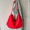 Bolsa de mão da moda e versátil em formato de bolinho para mulheres, nova coleção 2026, bolsa de ombro cruzado, bolsa de axila simples e estilosa, adequada para vendas transfronteiriças