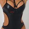 Mono Sexy de Cuero de Venta Caliente Europeo y Americano Mono con Tirantes de Charol Bodie Lencería Negra Fábrica