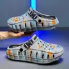 Zuecos para Hombre 2026 Verano Nuevo Estilo Exteriores Suela Suave Cómodos Chanclas de Playa Conducción Casual Talla Grande Zapatos Perforados