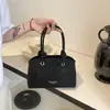 Bolso para Mujer 2026 Nuevo Estilo Gran Capacidad Diseño de Nicho Bolso de Hombro Casual Bolso de Mano Cruzado Tipo Cubo