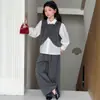 Conjunto de Primavera Estilo Universitario para Niñas Modelo Nuevo 2026 Chaleco con Lazo Camisa Traje de Tres Piezas para Niños