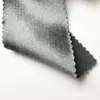 Tejido de satén elástico, grueso y brillante con una caída suave, que presenta un efecto reluciente de seda artificial, adecuado para disfraces de baile y ropa formal.