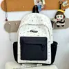 Leche Ligera con Sensación de Oxígeno Mochila de Lunares Ufu Campus Estilo Coreano Dulce Reductora de Edad Chica Viaje Compras Mochila de Alto Valor