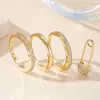Anillo de Luz de Zirconia Incrustada en Oro Real Chapado en Cobre Transfronterizo Europeo y Americano Lujo Ligero Sensación de Alta Gama Anillo para el Dedo Joyería de Mano Versátil Fabricante Venta al por Mayor en Stock