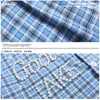 Roupas Masculinas Retro Americano Xadrez Ombro Direito Manga Curta Camisa Feminina Design de Miçangas Casual Curta Verão Camisa