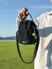 Bolsa de Color Block de Nailon para Botella de Agua con Cordón para Mujer 2025 Nuevo Casual Cruzada para Teléfono Mochila Tendencia